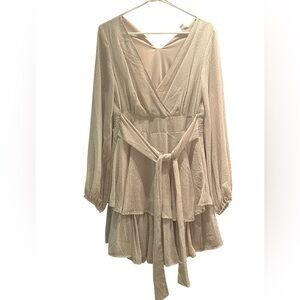 short long-sleeve dress made of light fabric in white and cream, you could